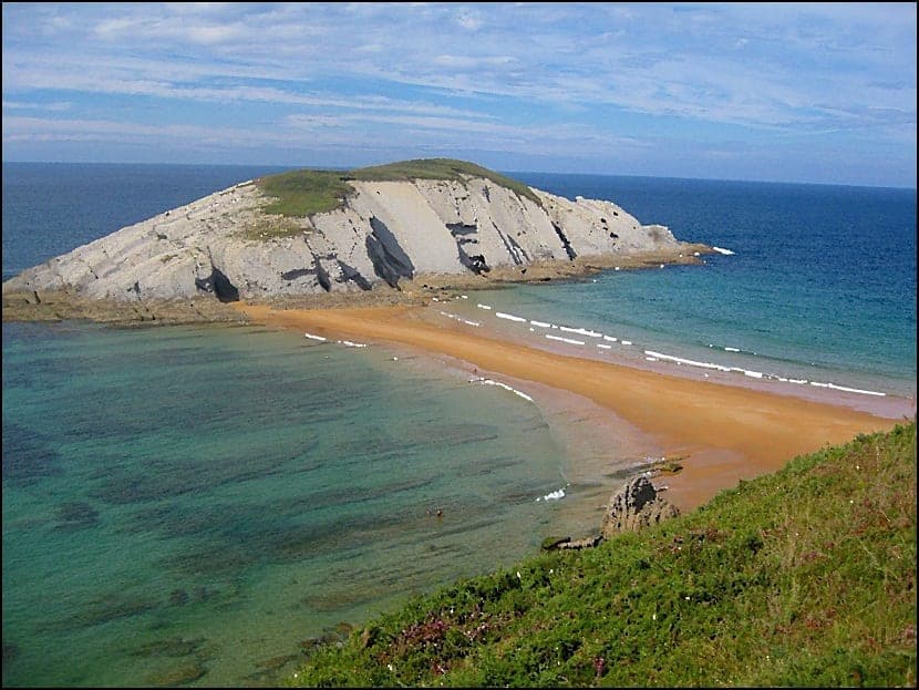 Sandy exits to an island in the sea